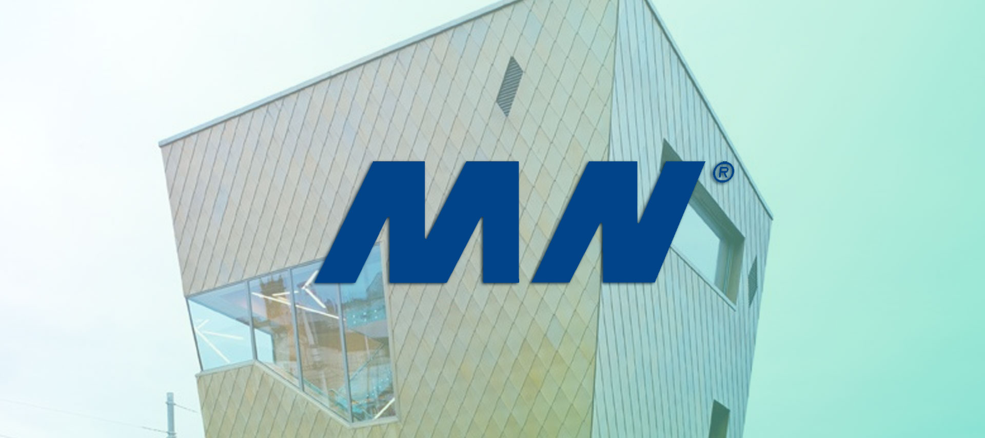 MN Metall partnership building façade with perforated metal cladding system