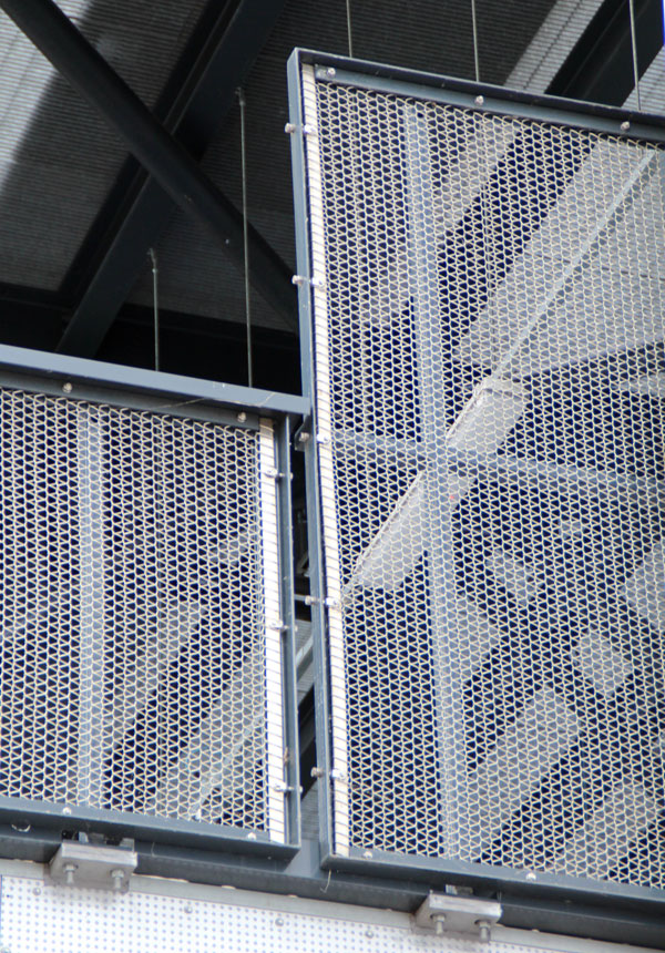 External metal mesh balustrade detail at Gantry East London with spiral mesh system