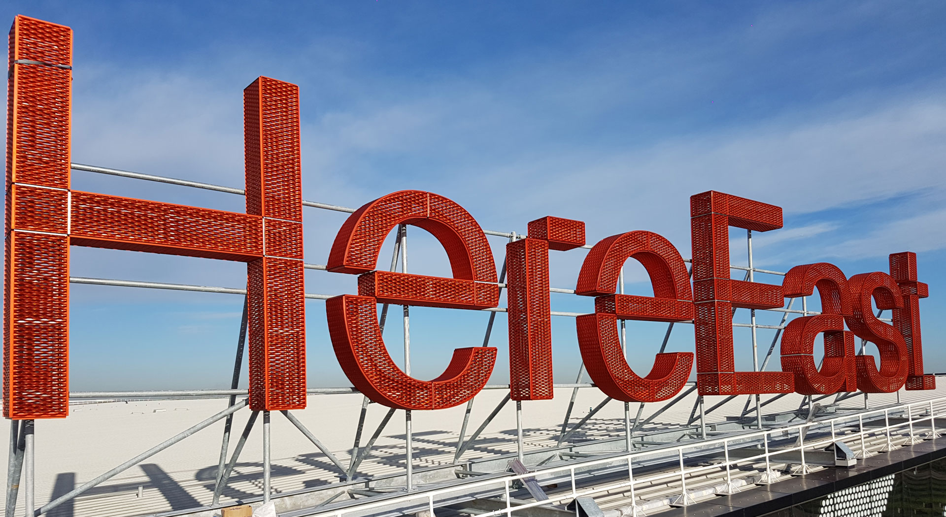 HereEastSign-Expanded-LRGLAND2 Large Here East rooftop sign with expanded metal mesh backing structure