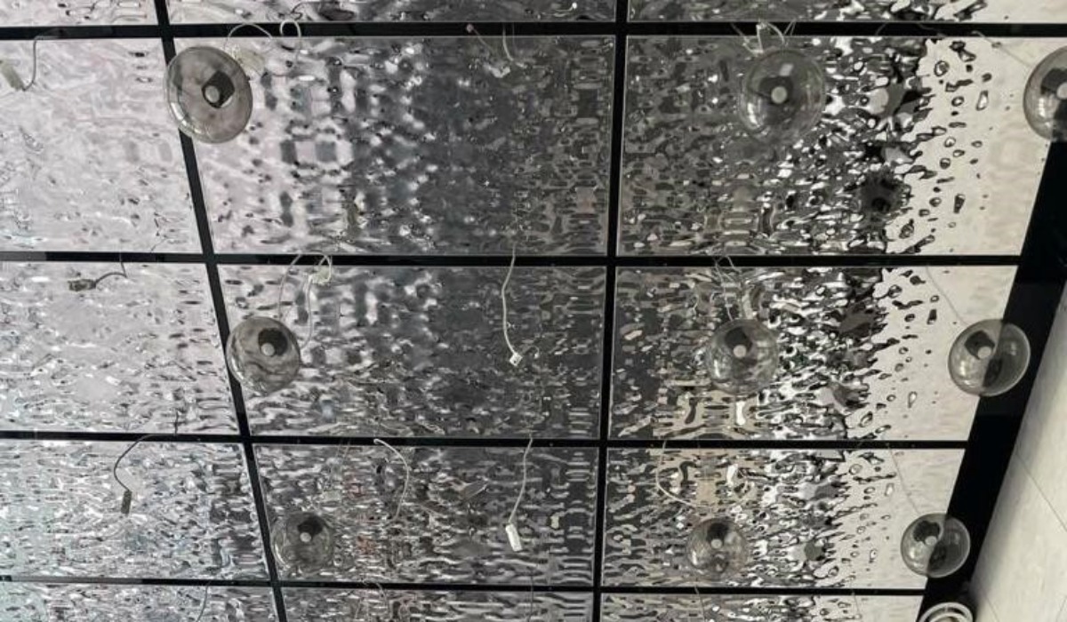 A silver reflective water ripple ceiling panels