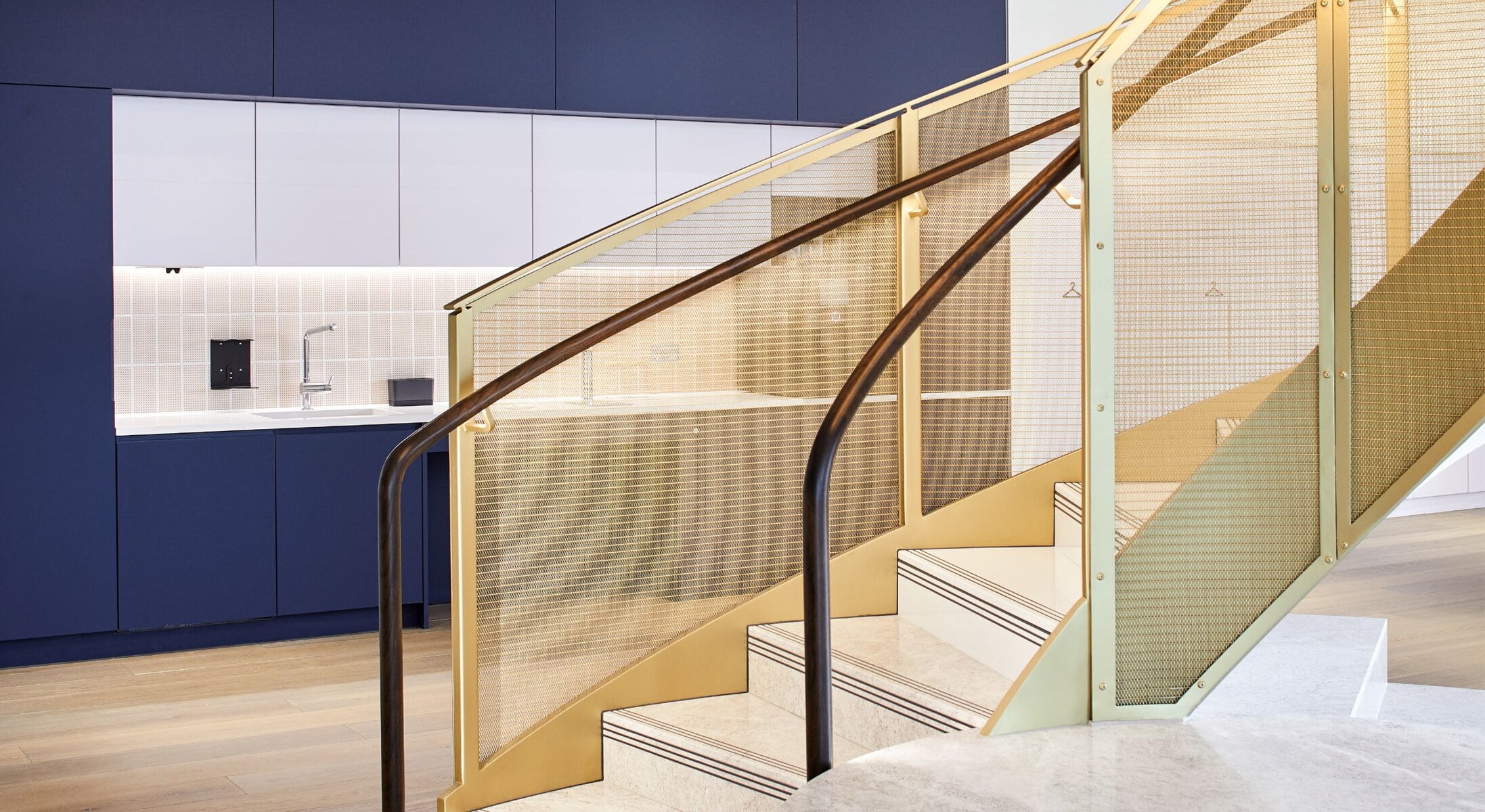 PVD coated Champange Woven mesh, a Champagne spiral staircase.