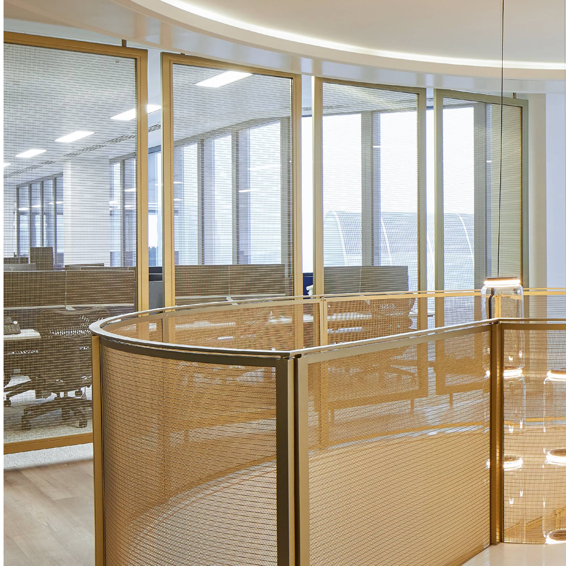 Top of staircase, with Woven mesh Champagne PVD.