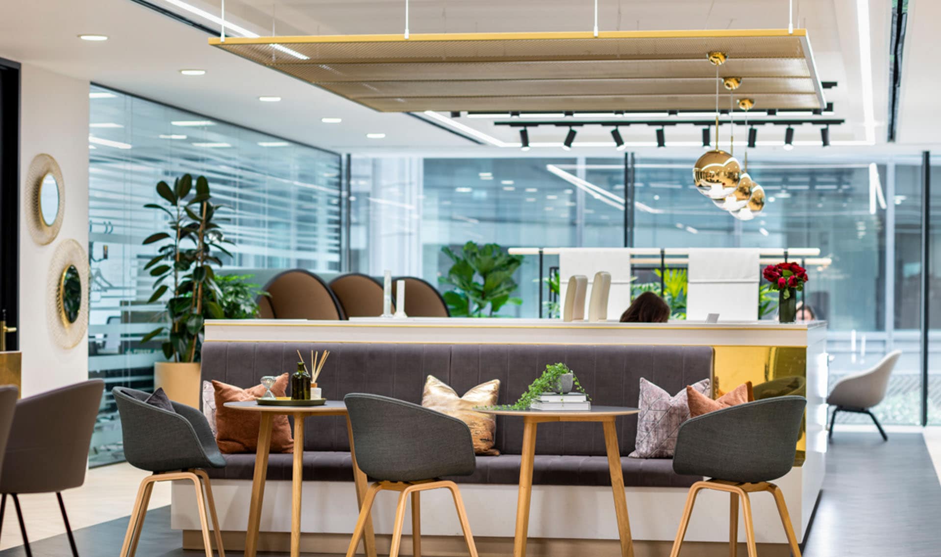 Dinning area in an office with Gold AC400 Metal mesh ceiling system